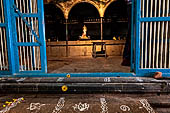 Worship and puja offerings inside the Swamimalai temple.